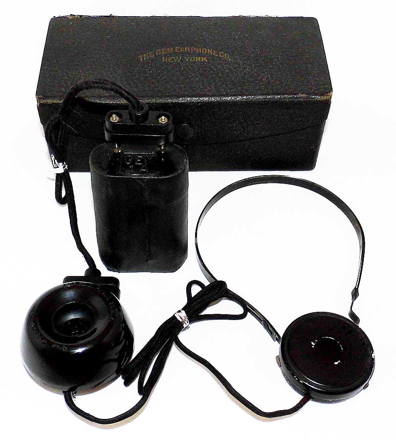 Image of a Vintage Battery case with Microphone and Headphones