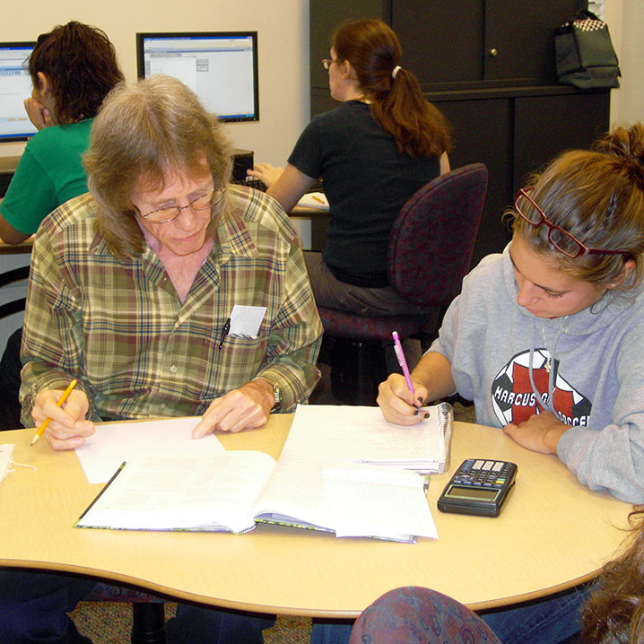 A tutor helping a student
