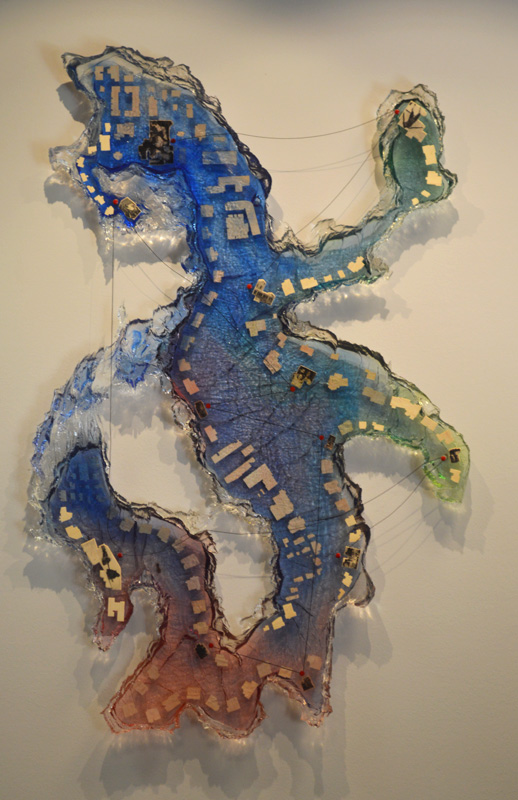 Resin with intaglio printed balsa wood, pins and string