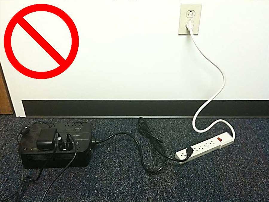 Another example of a power strip plugged into a UPS strip