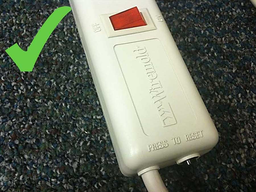 A power strip with resettable circuit breaker