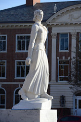 A photo of a statue of a woman on Texas Woman's University's Denton campus.